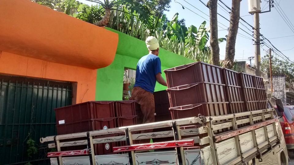 Delivery of compost kits to selected households